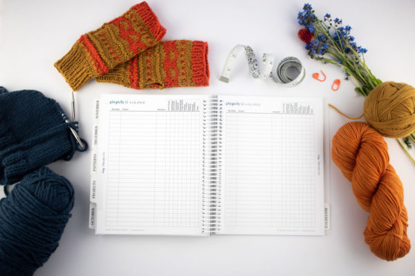 The 2023 Knitter's Planner Project at a Glance page with knitting projects, yarn, and flowers